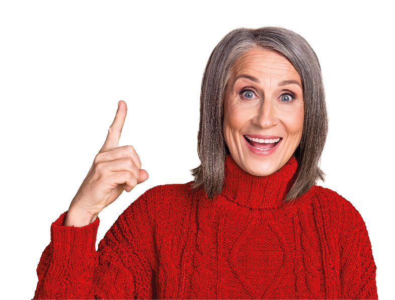 Excited older woman with gray hair joyfully pointing upward while wearing a cozy brown sweater. Perfect for themes of happiness, elderly fashion, and inspirational gestures.