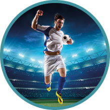 Young professional basketball player in uniform on a floodlit sports arena celebrates victory